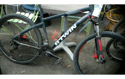 VTT ROCKRIDER  (500E NEUF)