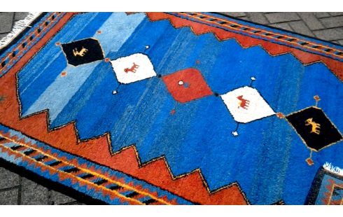 TAPIS NOUE MAIN BLEUE MET ROUGE
