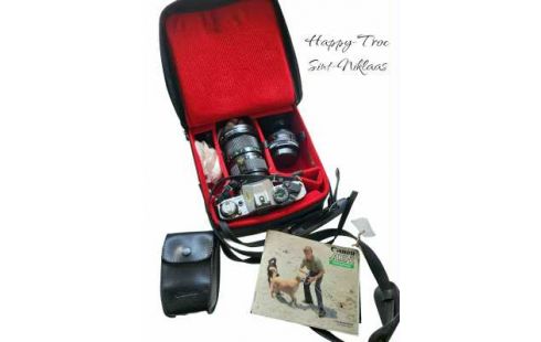 FOTOTOESTEL CANON AE1 MET ACCESSOIRES