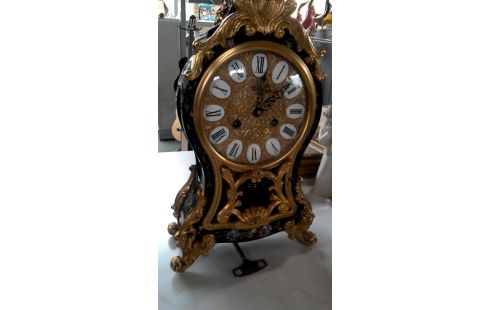 UHR SCHWARZ BLUME MET BRONZE