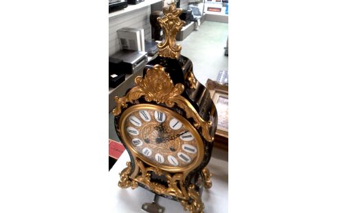 UHR SCHWARZ BLUME MET BRONZE