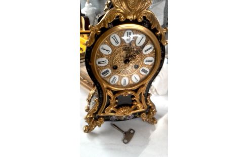 UHR SCHWARZ BLUME MET BRONZE