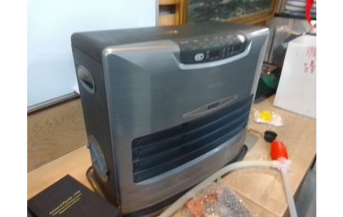 POELE A PETROLE + ACCESSOIRES EN L'ETAT