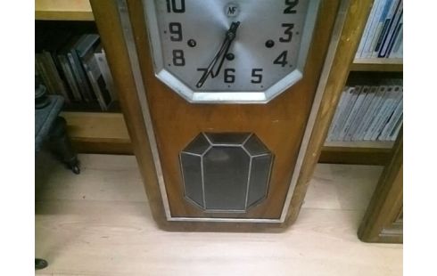 PENDULE MURALE SANS CLEF