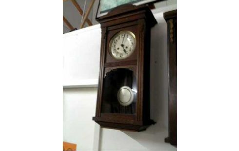 PENDULE FONCE SCULPTE