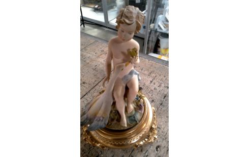 STATUETTE GARCON MET