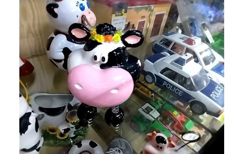 DECORATION Vache pieds ressorts tirelire