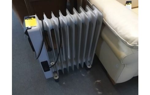 RADIATEUR BAIN D'HUILE .