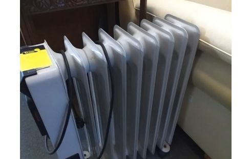 RADIATEUR BAIN D'HUILE .