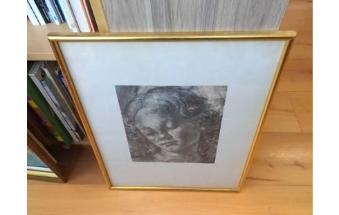 CADRE BORD DORE MOTIF VISAGE