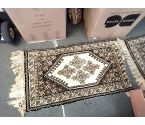 TAPIS PM MARRON (qqes taches)