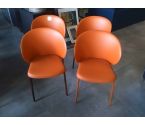 4 CHAISES PLASTIQUE ROUILLE .