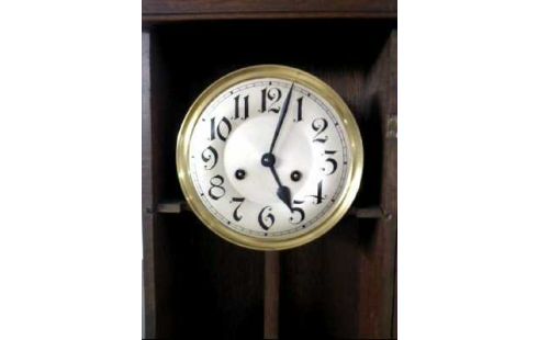 PENDULE FONCE SCULPTE