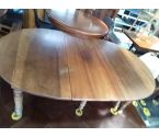 TABLE OVALE 2 ALLONGES SUR ROULETTES
